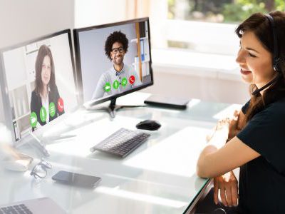 Woman working virtually with clients